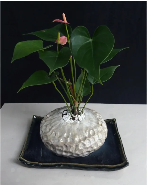 圖 4-3 浮光掠影 陳秀容 18x18x8cm 陶土 2014 