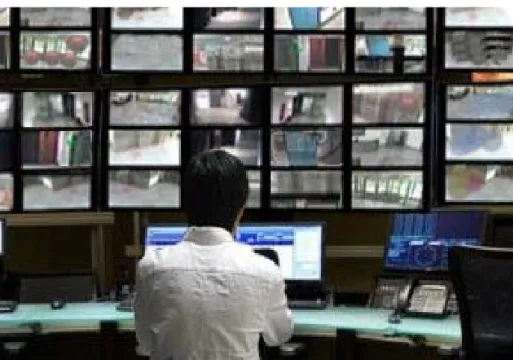 Figure 1: A conventional surveillance system with multiple screens.