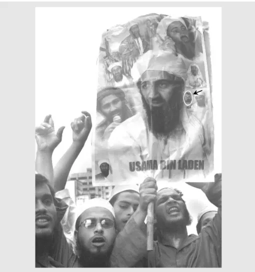 Figure 1-6. An image of Bert appears just to the right of Osama bin Laden (AP Wide World.)