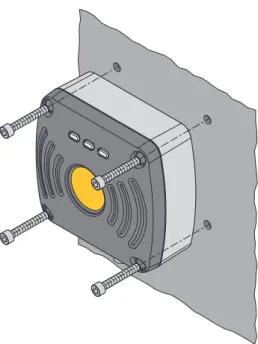 Fig. 5: Screwing the read/write head onto the mounting plate