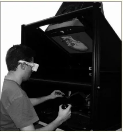 Figure 2-3 Showing the ImmersiveTouch™ system in operation. (Alaraj et al. 