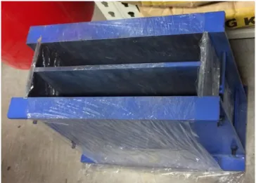 Figure 3.10: Cast iron mould with plastic wrapping 