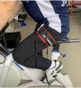Figure 1.1 A method of applying blood flow restriction at the lower limbs  During BFR training, the leg arteries' blood flow has a non -linear relationship  with the cuff pressure, whereby the leg arteries' blood flow is similar when the cuff  pressure is 