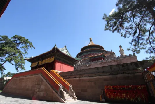10, Fig. 11, and Fig. 12 for the photo, the structure and the front facade  of the Xuguang Pavilion and its base