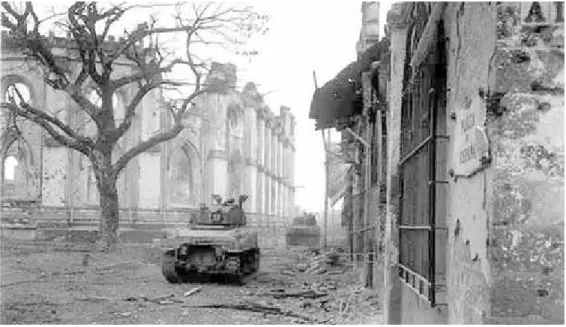 Fig. 1. Ruins of Sto. Domingo Church behind US tanks in the Plaza de España, February 1945  (photo courtesy of EWebPro, ©1997-2003)