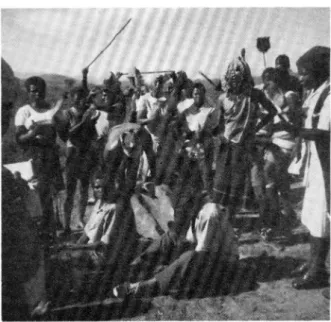 Fig.  3.  The  performance  of iza-  ngoma  dance-songs  to  the  acc­
