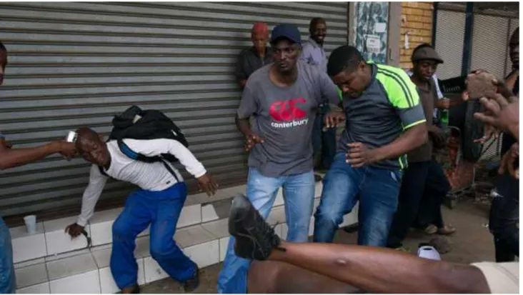 Fig 5.4. A mob attacks a Nigerian man in Pretoria 