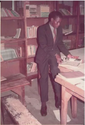 Figure  3.3.  Thokozani  as  a  qualified  teacher  trying  to  make  use  of  limited  library  resources